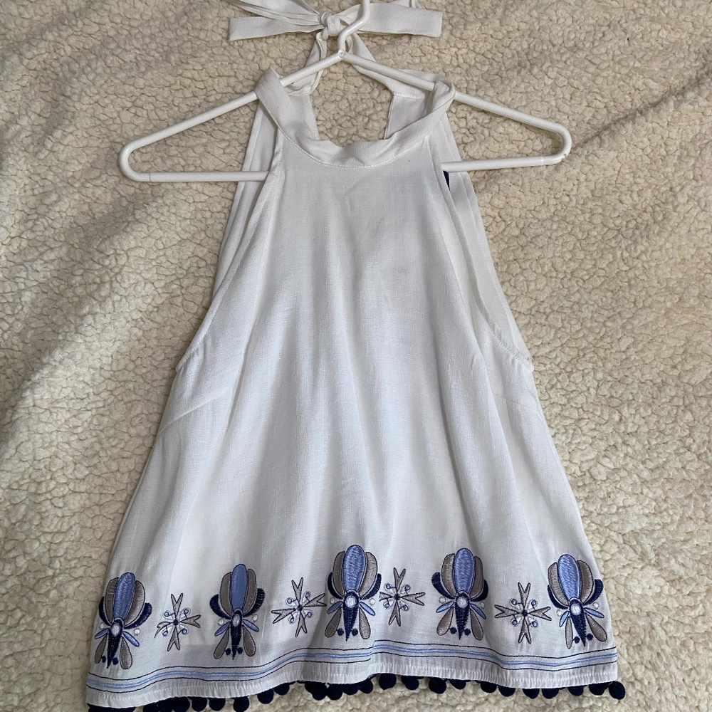 Francesca's Fancy Halter top with sewn detail and pom moms